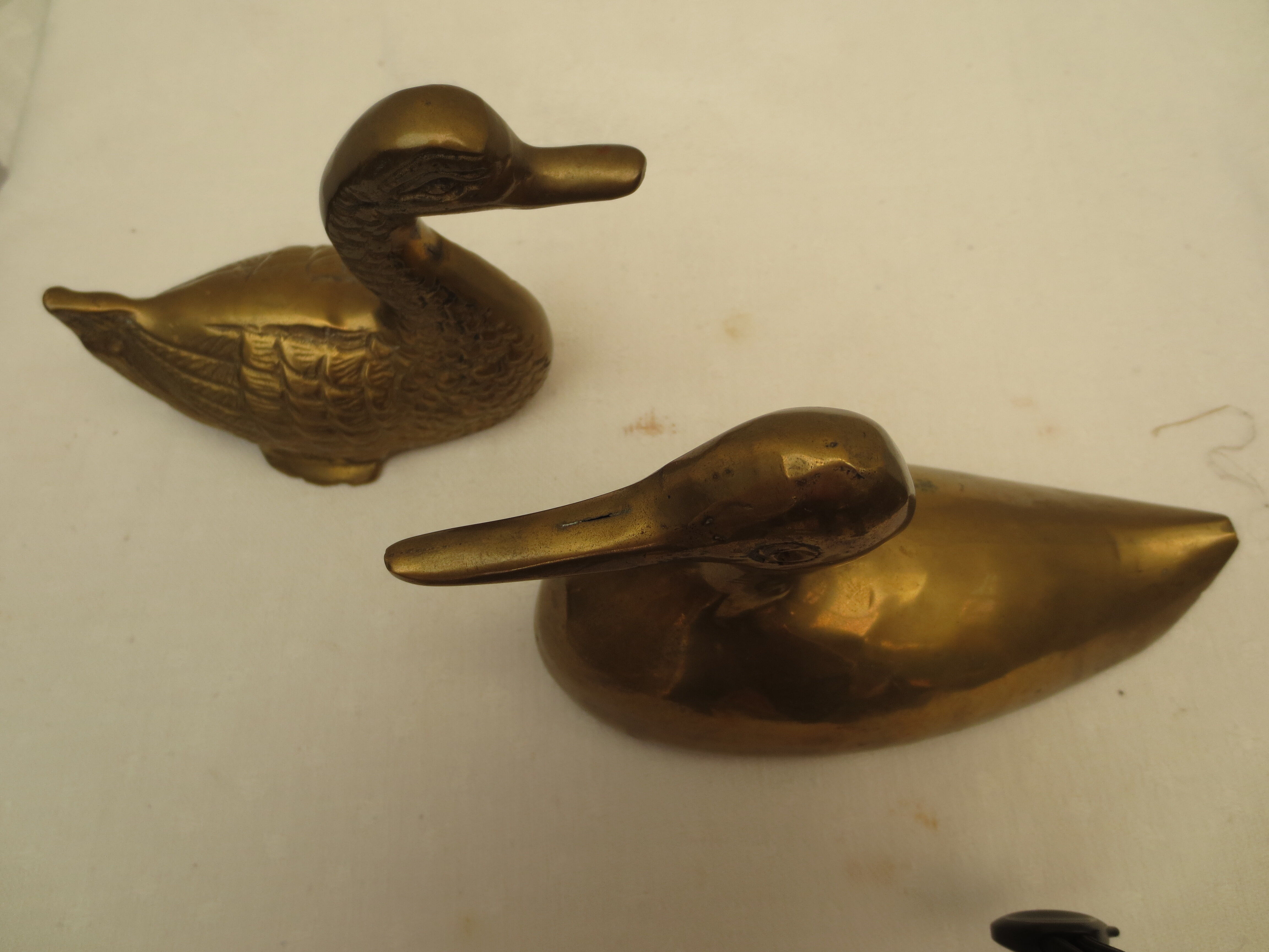 Vintage brass duck duo
