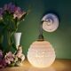 Vintage pink Clichy glass globe wall light.