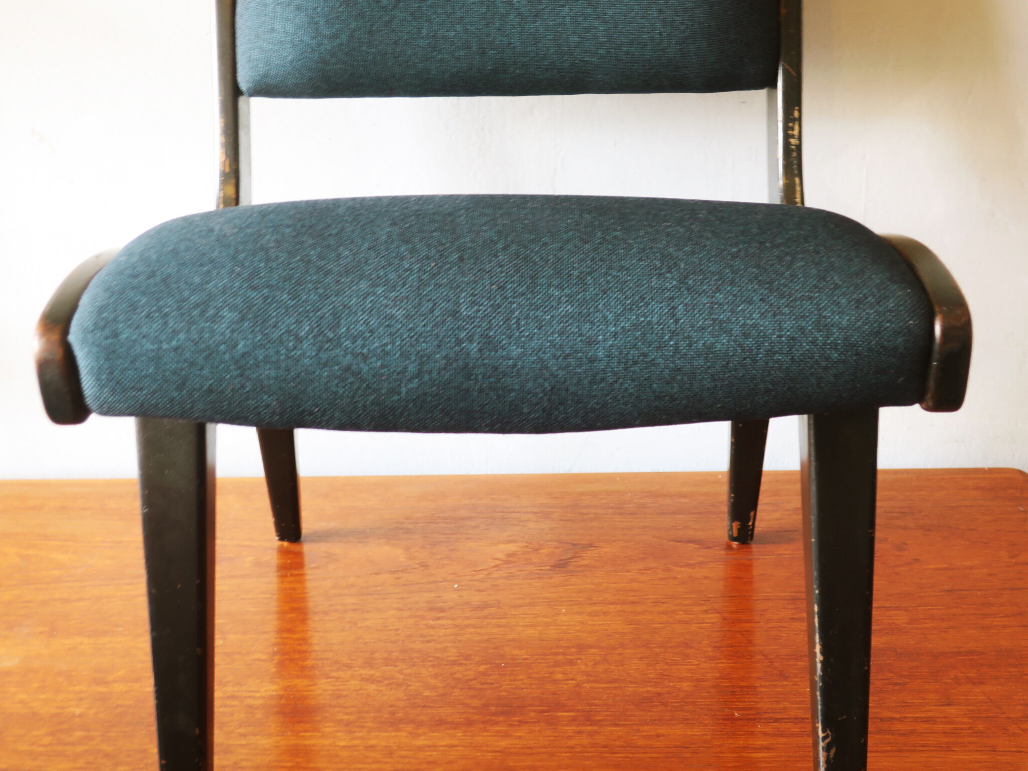 Jens Risom armless chair with ebonized frame and petrol blue-green covers