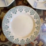 7 matching dessert plates in red green and blue.