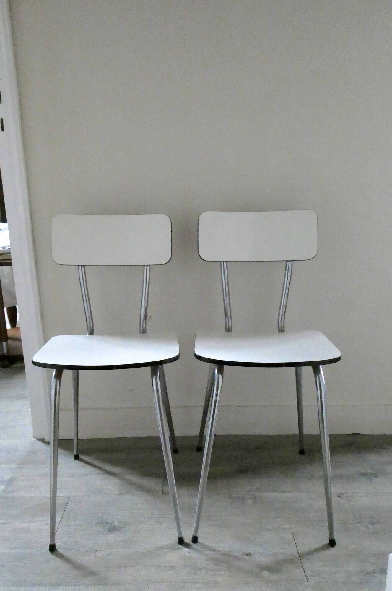 Pair of white formica and slender feet of the 60s Chair