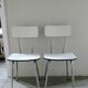 Pair of white formica and slender feet of the 60s Chair