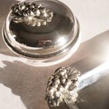 Silver-plated metal coffee service with a grape design.