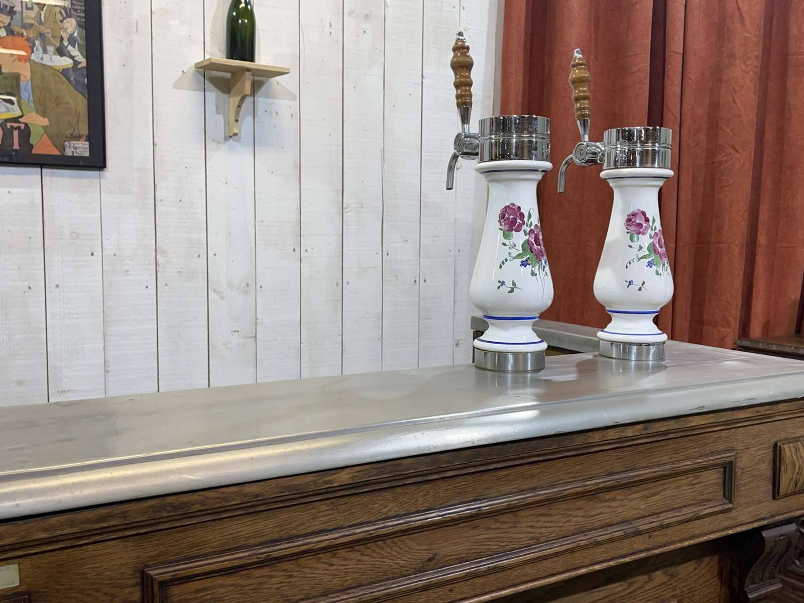 Bar counter in oak, zinc, and white marble from the early 20th century.