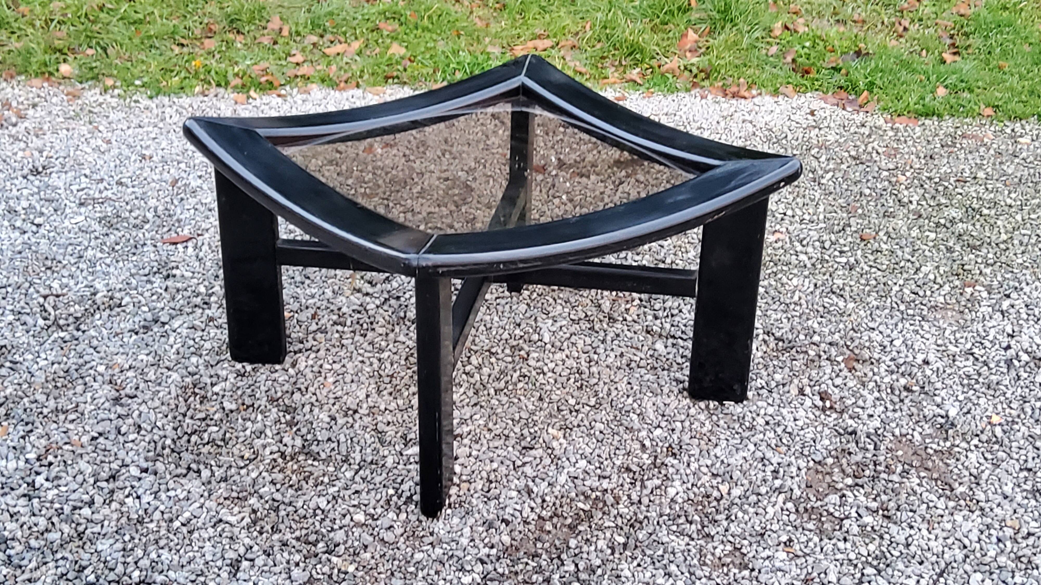 70s design coffee table in black lacquered wood with smoked glass top