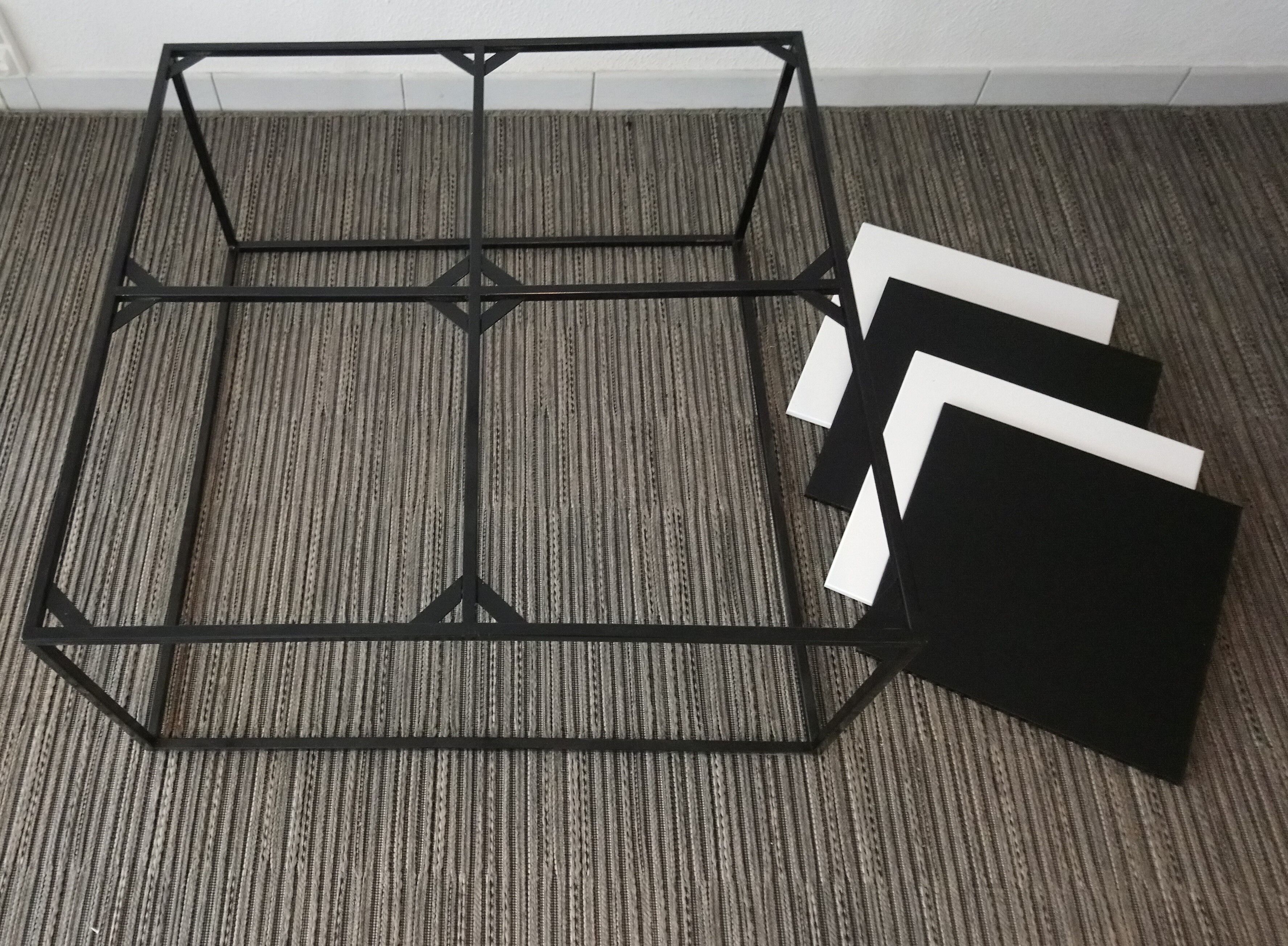 Square coffee table has checkered 80s