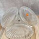 Vintage glass serving tray with silver-plated handle.