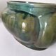 Art Deco flared cache-pot in turquoise glazed earthenware.