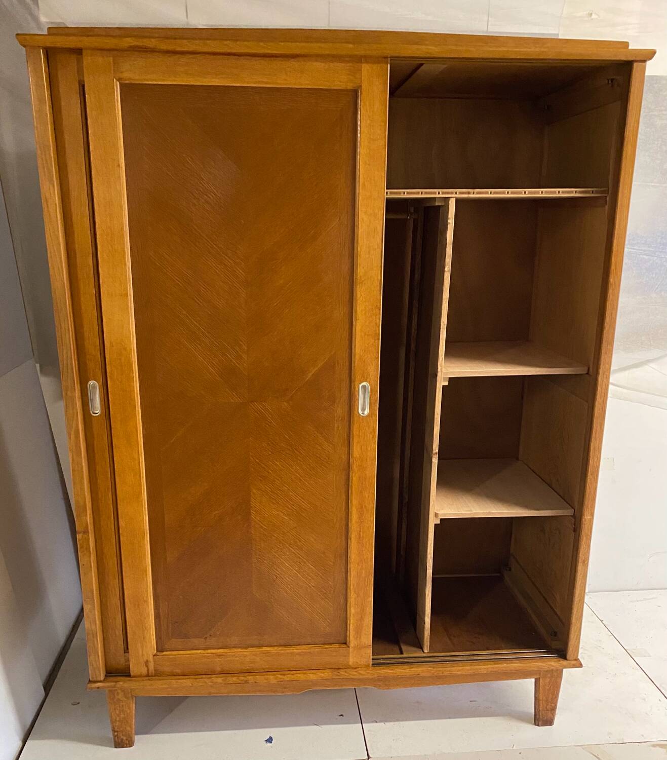 Vintage wardrobe with compass feet, sliding doors