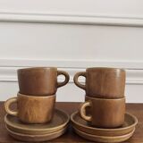 4 stoneware coffee cups and saucers