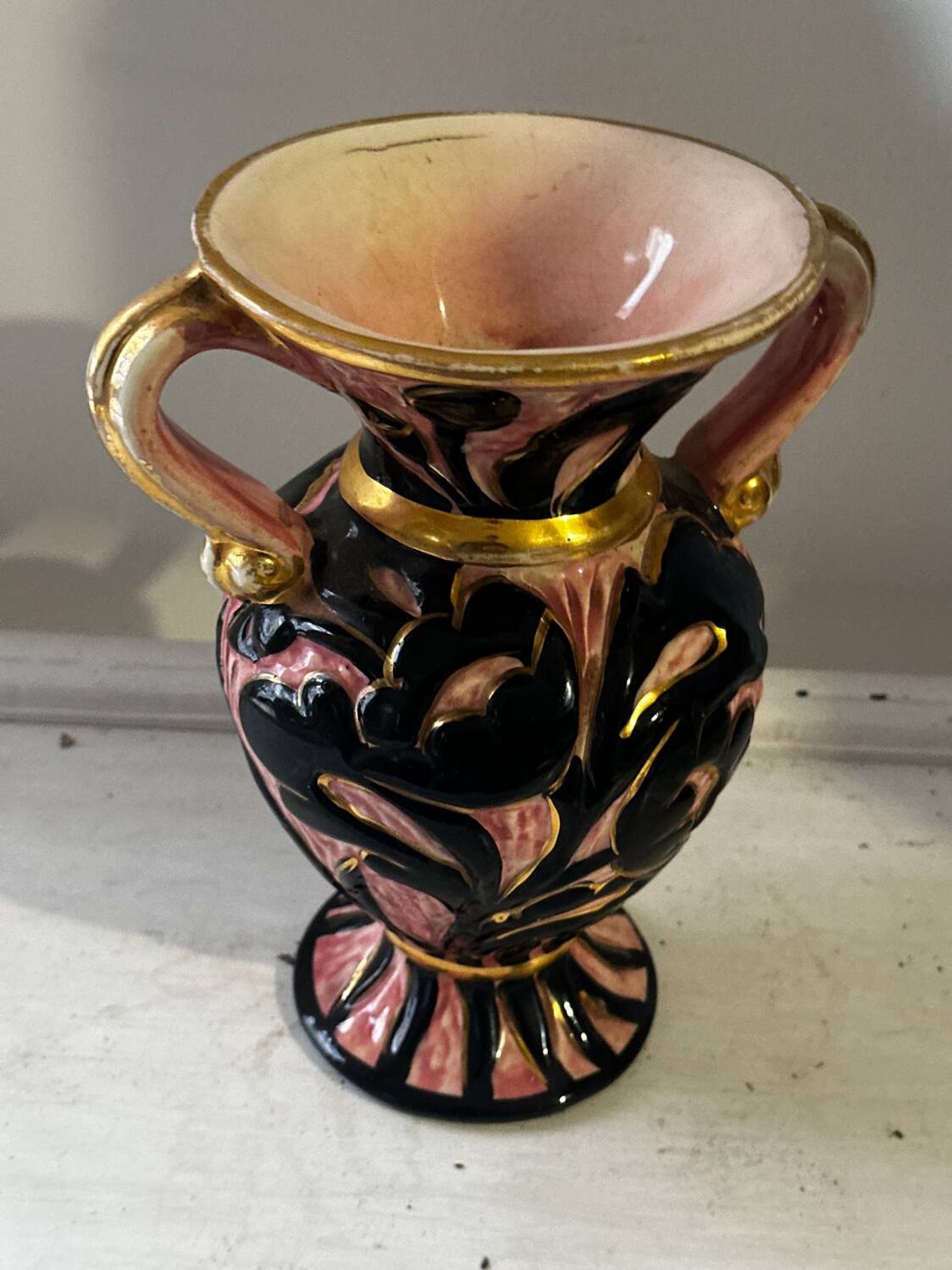 Vintage Vallauris vase amphora with relief floral decoration.