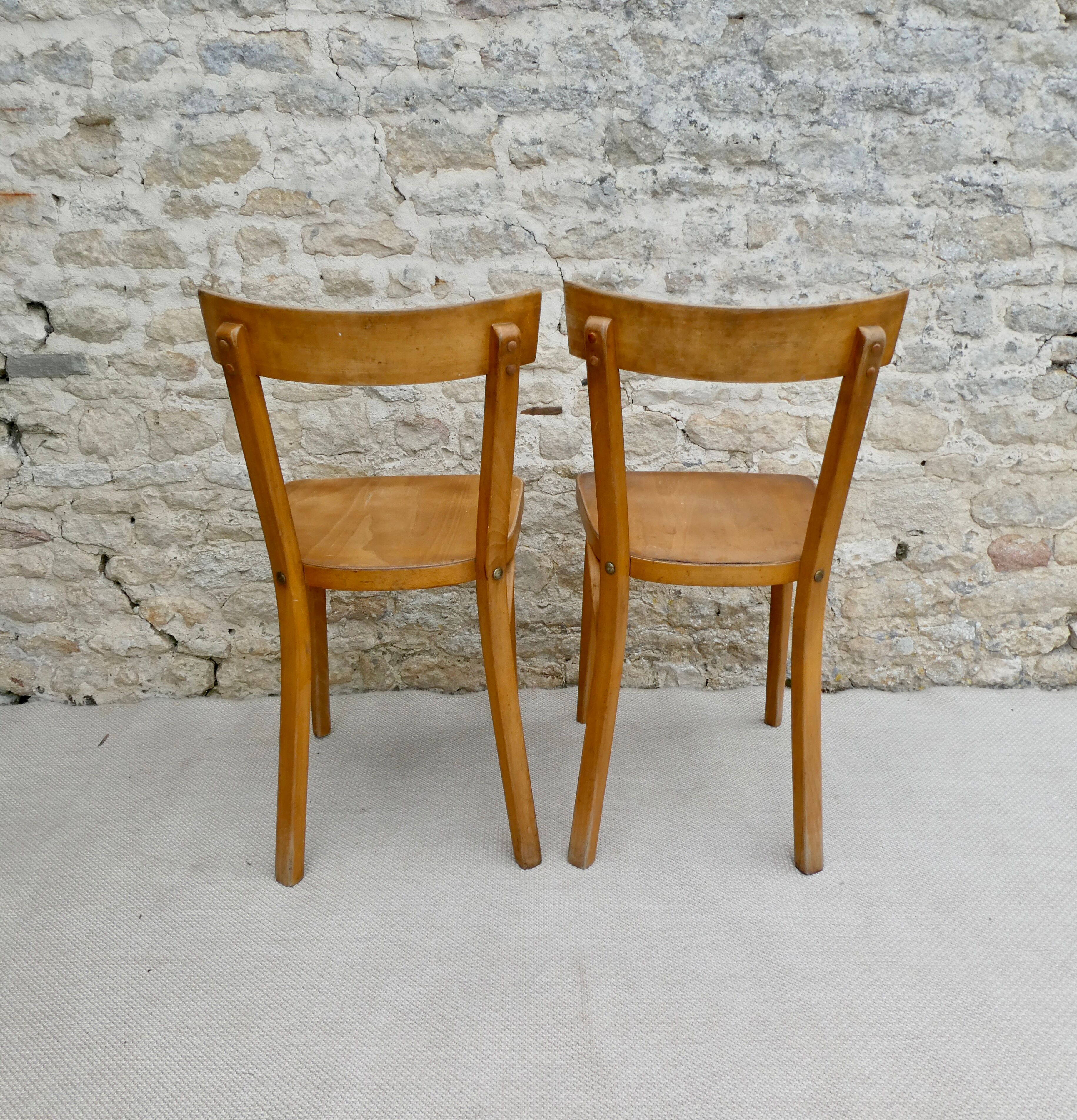 Pair of Baumann bistro chairs in light wood