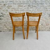 Pair of Baumann bistro chairs in light wood