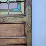porte en chêne avec des vitraux