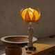 Vintage table lamp in Chinese porcelain with yellow floral shade, mid-20th century.