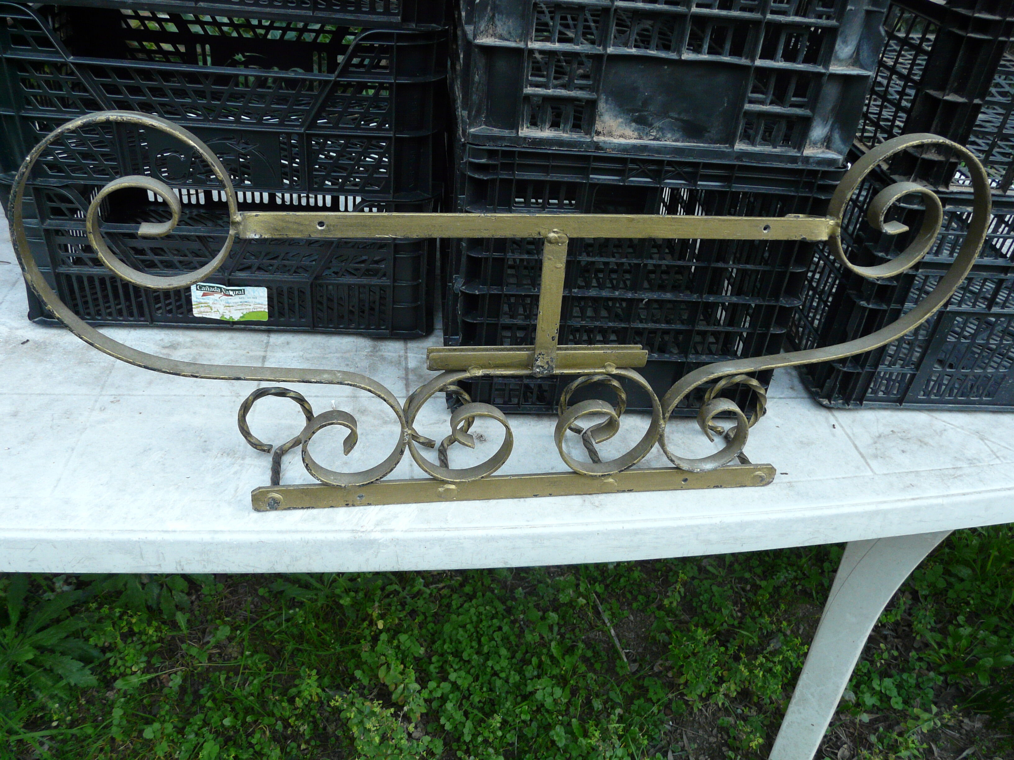Wall mounted wrought iron coat rack from the 1970s