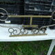 Wall mounted wrought iron coat rack from the 1970s