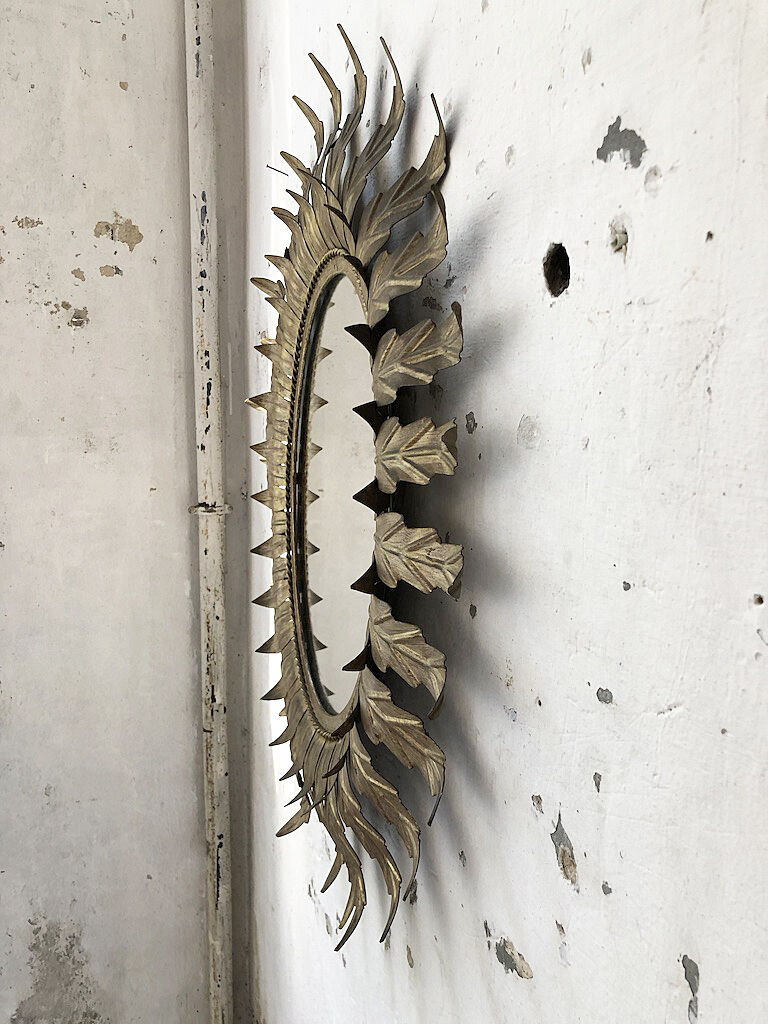 Golden mirror ancient flowery sun