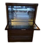 vintage mahogany bar cabinet with front-opening drawers in English style