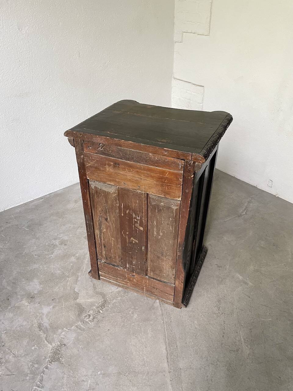 19th century chest of drawers in carved blackened pine