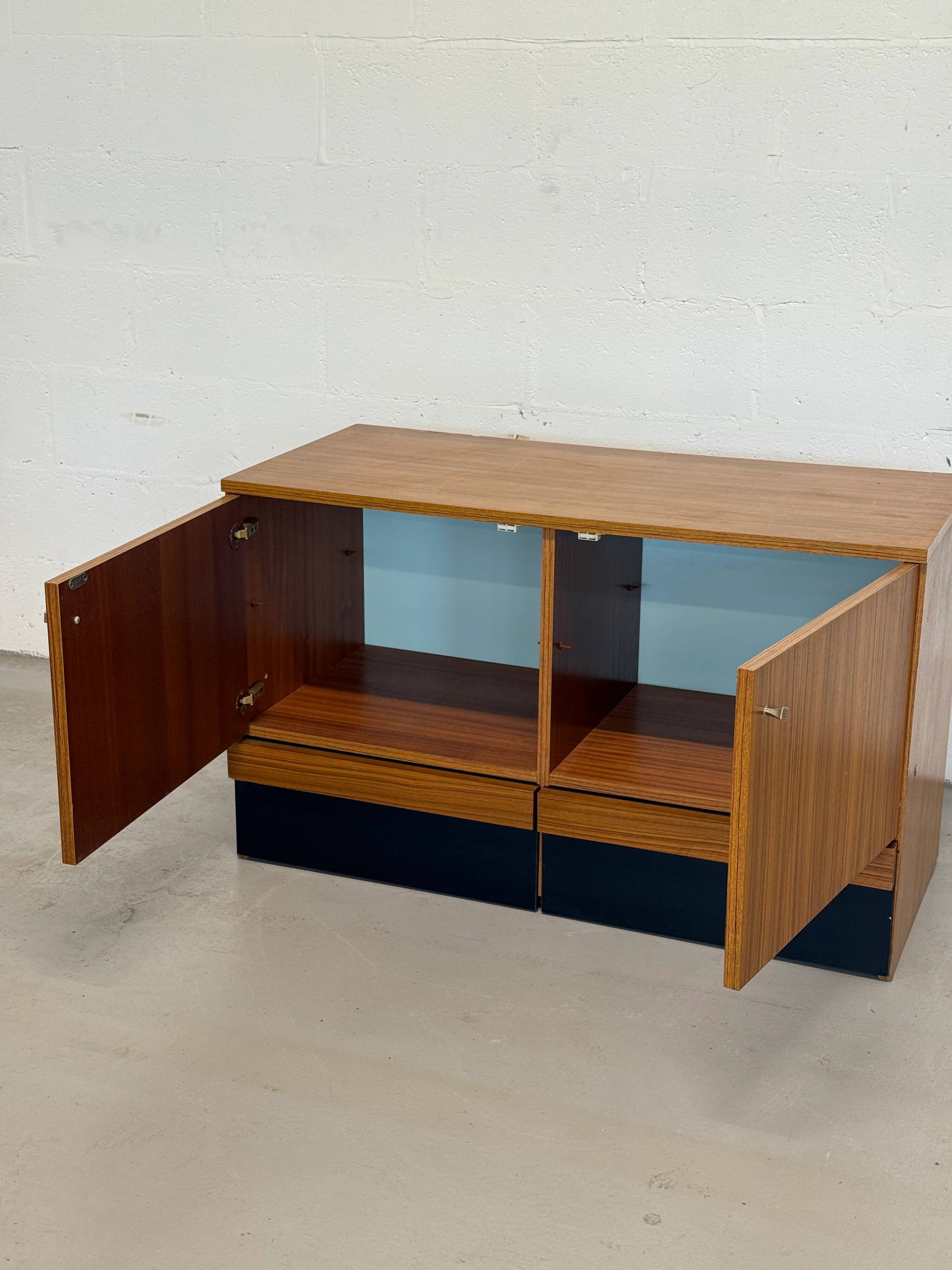 Vintage teak sideboard, mid-century style, with doors and drawers.
