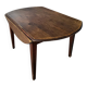 Antique round farmhouse table with drop-leaf doors in solid pegged wood
