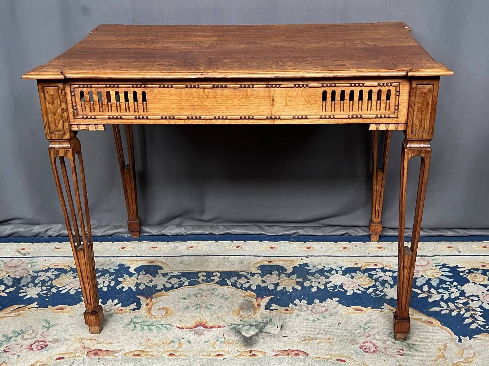Solid oak coffee table in Louis XVI style.