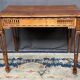Solid oak coffee table in Louis XVI style.