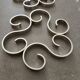 Christofle Gallia model silver-plated metal trivet