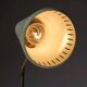 Adjustable table lamp in patinated brass and green metal