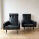 Pair of vintage 70s armchairs in black faux leather.