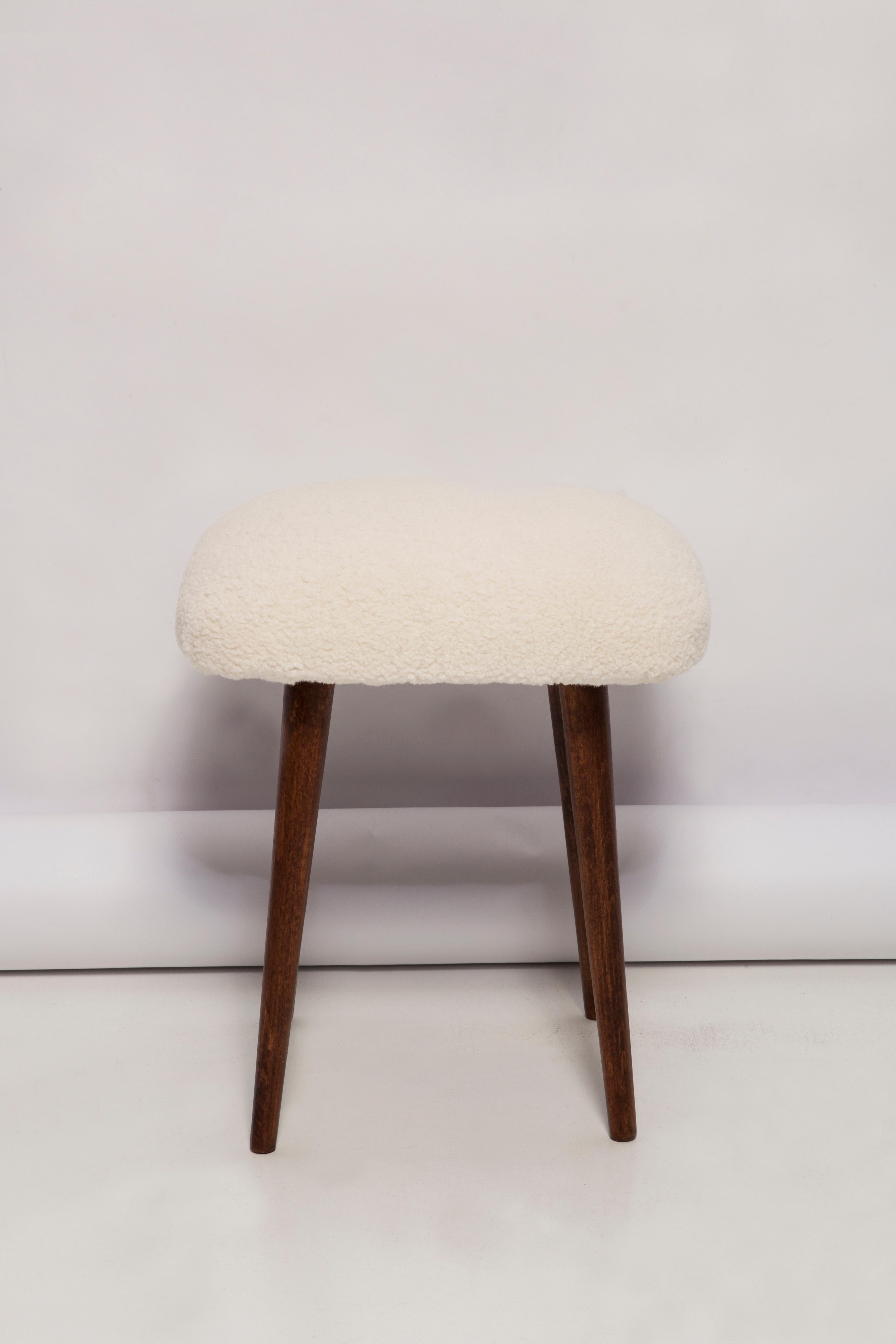 Set of two mid-century modern light beige boucle stools, Europe, 1960s.