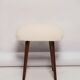 Set of two mid-century modern light beige boucle stools, Europe, 1960s.