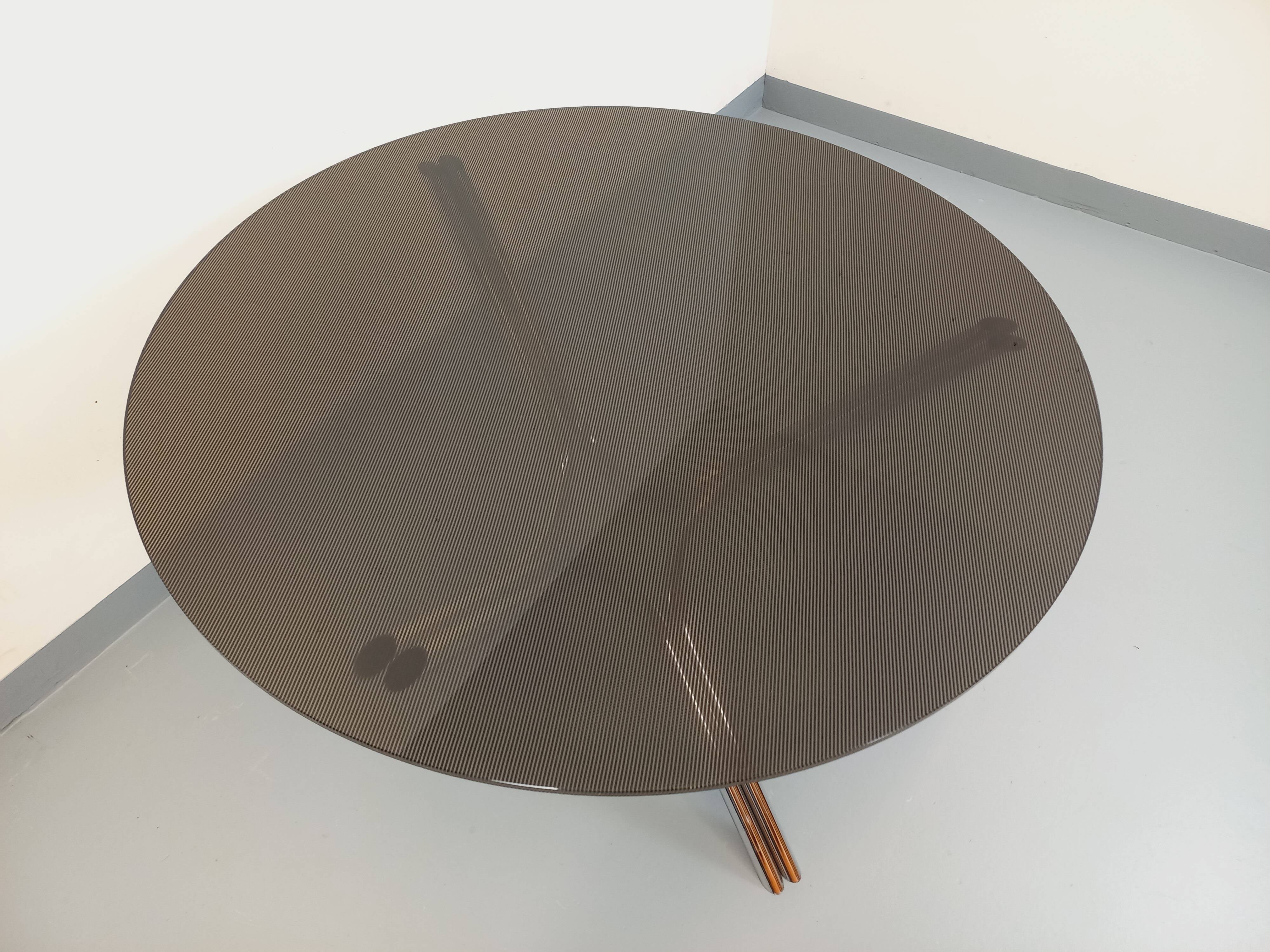 Vintage dining table in smoked glass plexiglass and chrome metal.