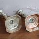 Pair of antique silver-plated metal candlesticks