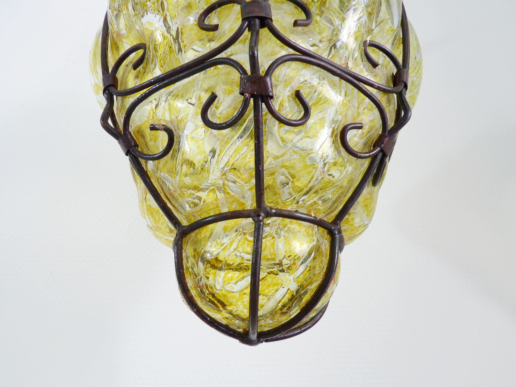 Italian vintage wall lamp in yellow blown glass and wrought iron. Year 70 80
