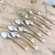 Large spoons and forks, silver metal