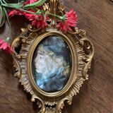 Italian baroque frame with portrait painted on silk.