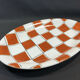 Ceramic dish of salins checkerboard orange and white vintage Napoli style