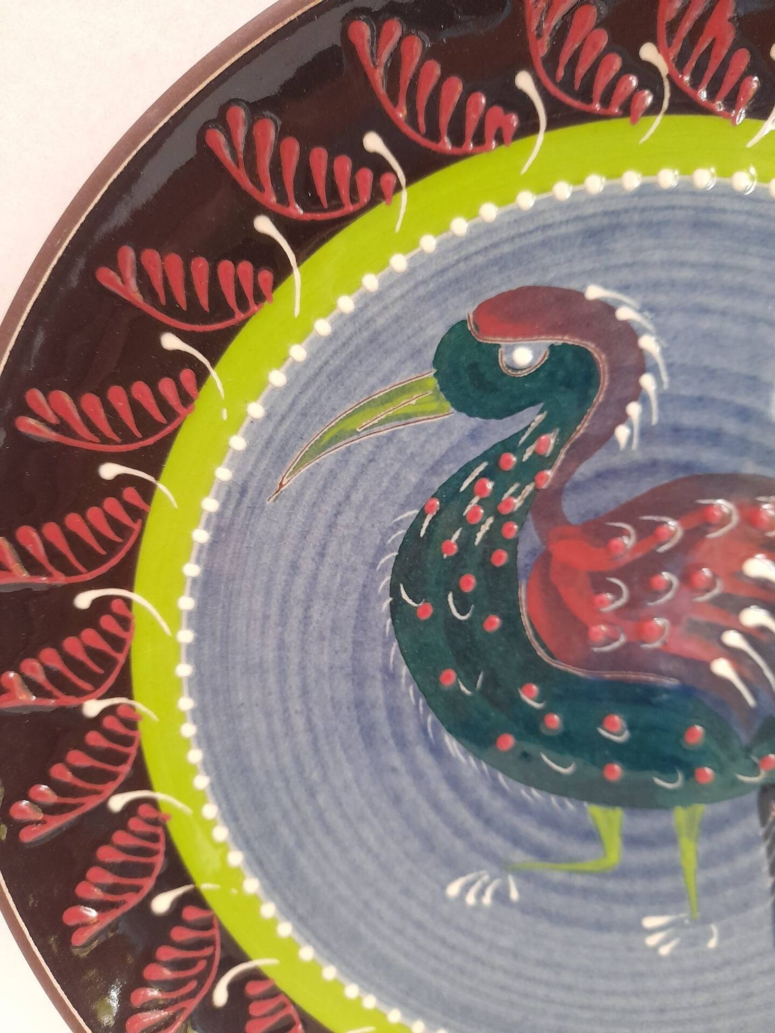 Assiette murale en céramique oiseau folklorique