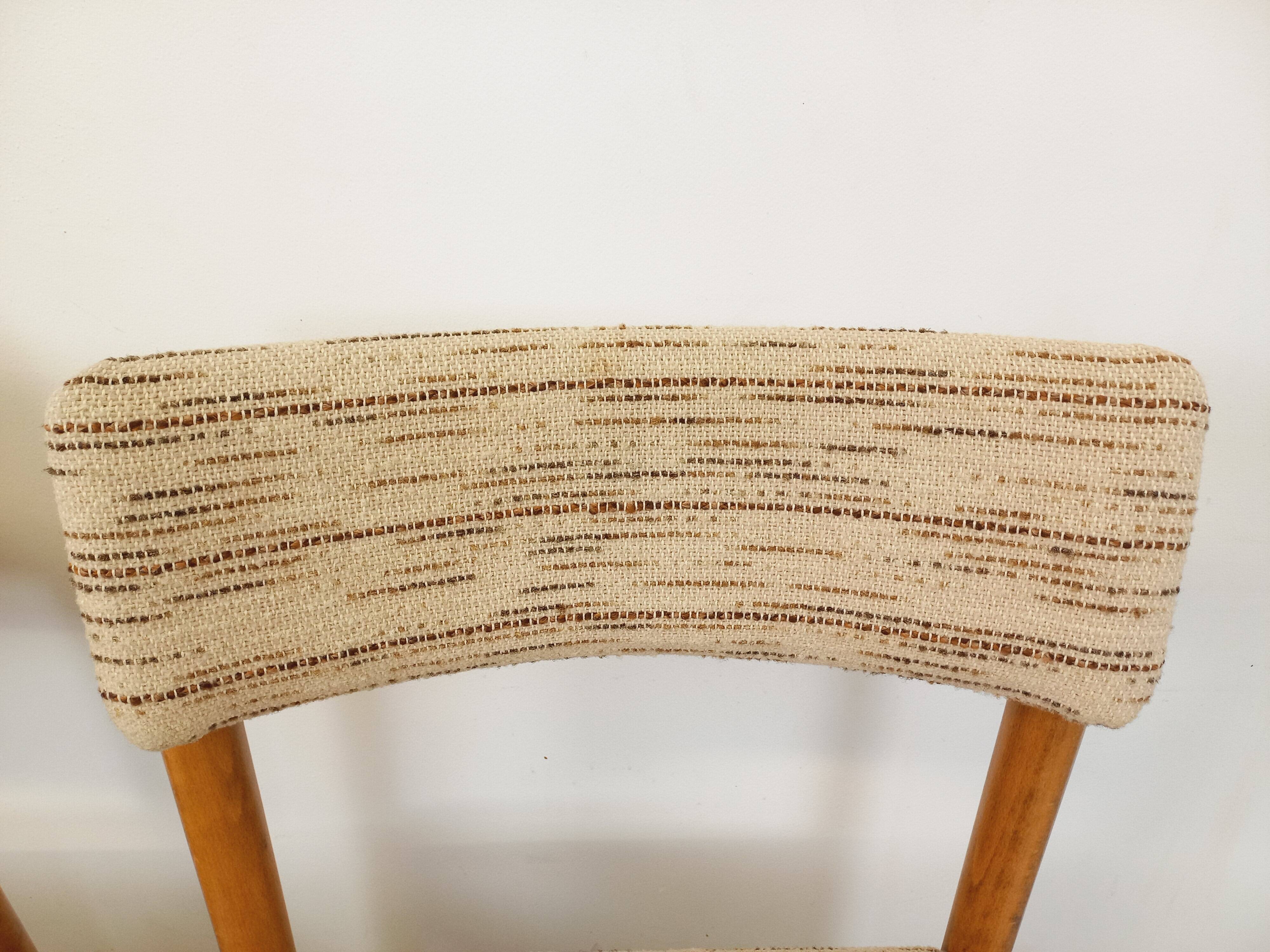 Pair of vintage Baumann chairs in wood and fabric from the 70s