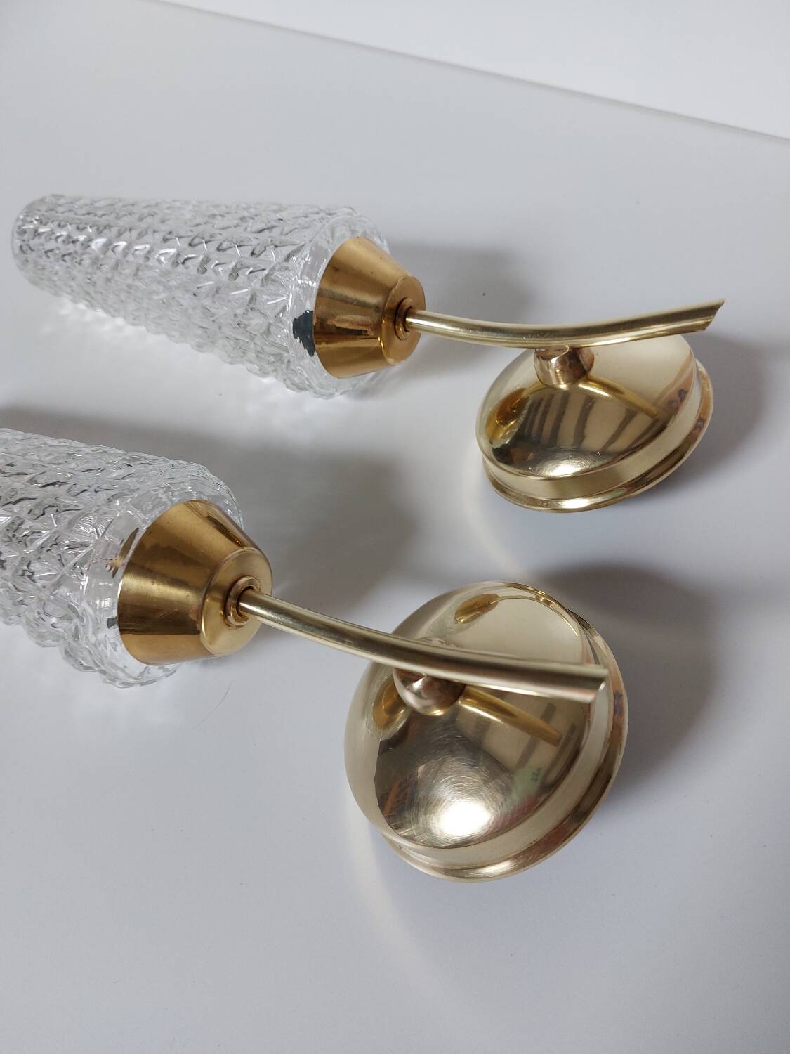 Pair of brass and glass wall lights