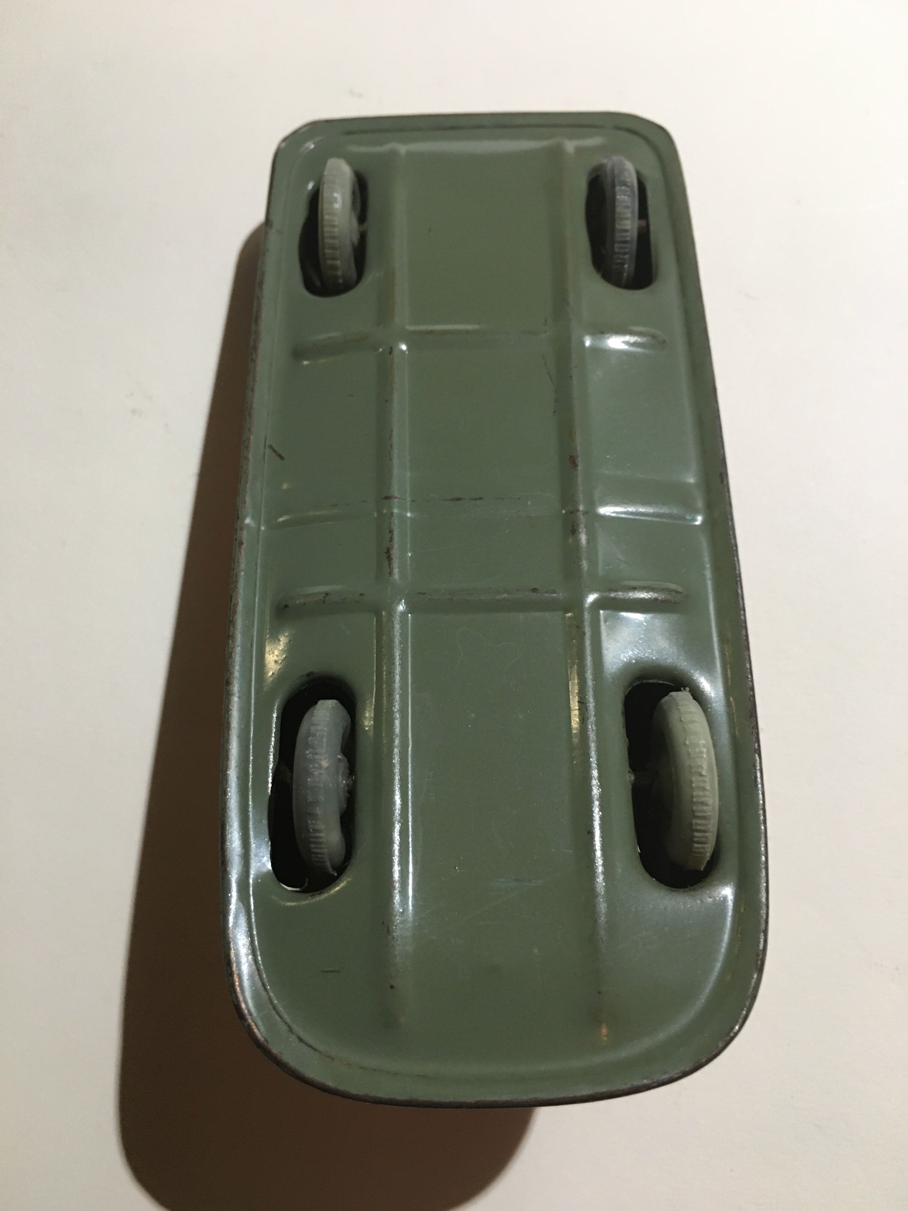 Mercedes miniature car in lithographed sheet metal