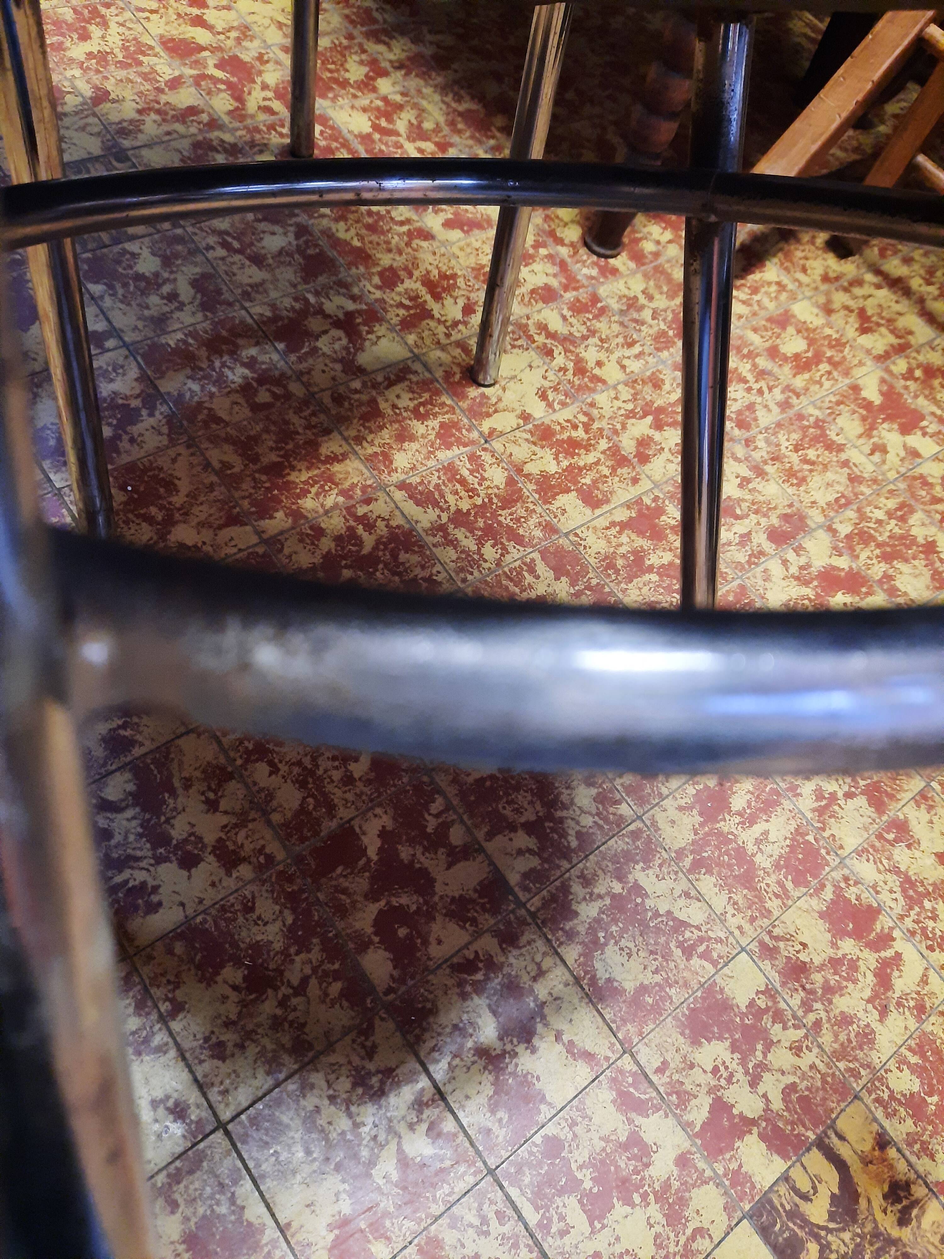 Pair of tubular metal bistro chairs