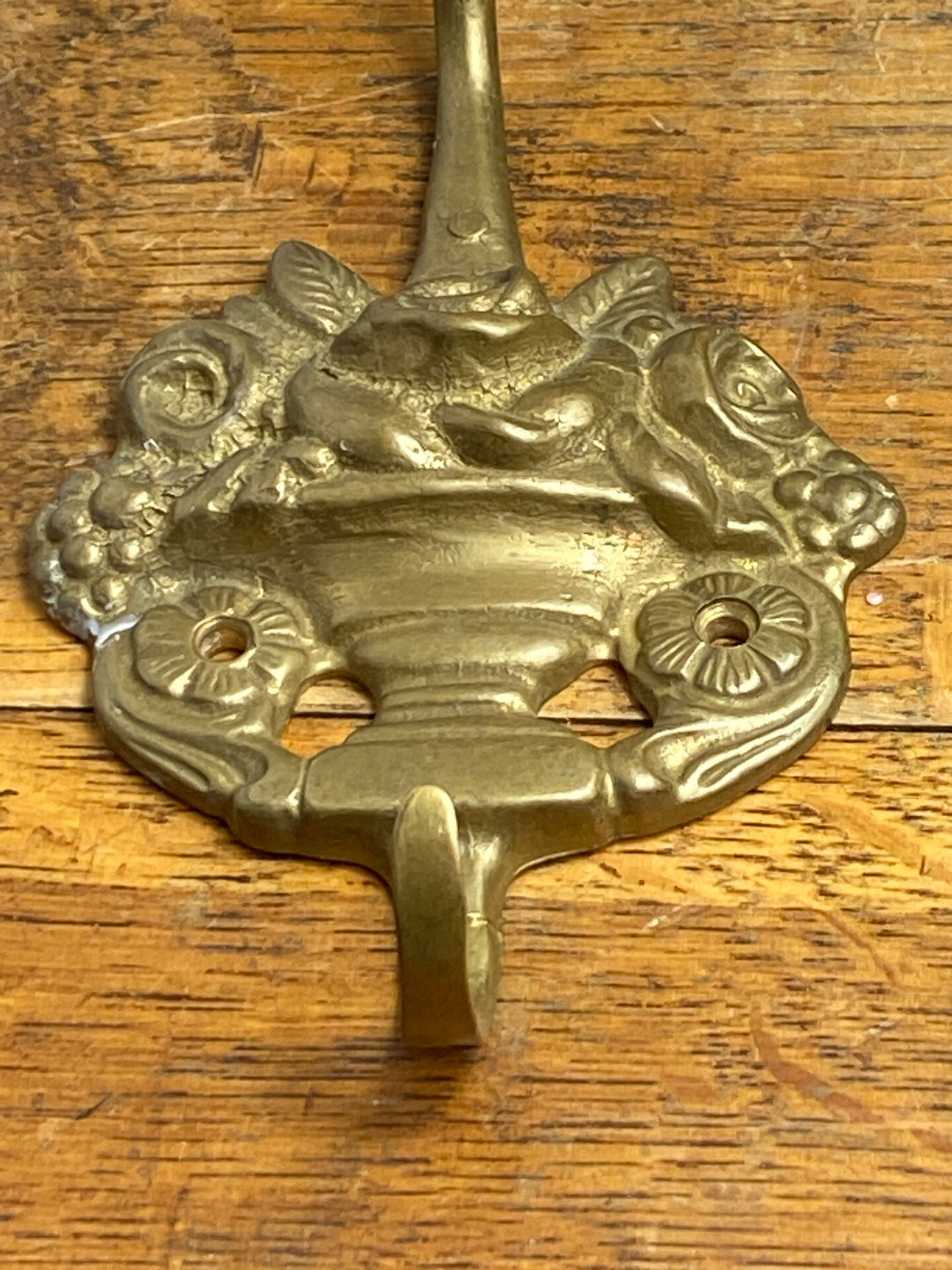Wall-mounted brass hook