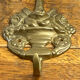 Wall-mounted brass hook