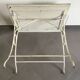 White wrought iron table