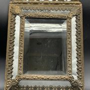 Small mirror with brass parcloses in repoussé style Louis XIV, late 19th century.