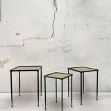 Suite of metal and glass nesting tables.