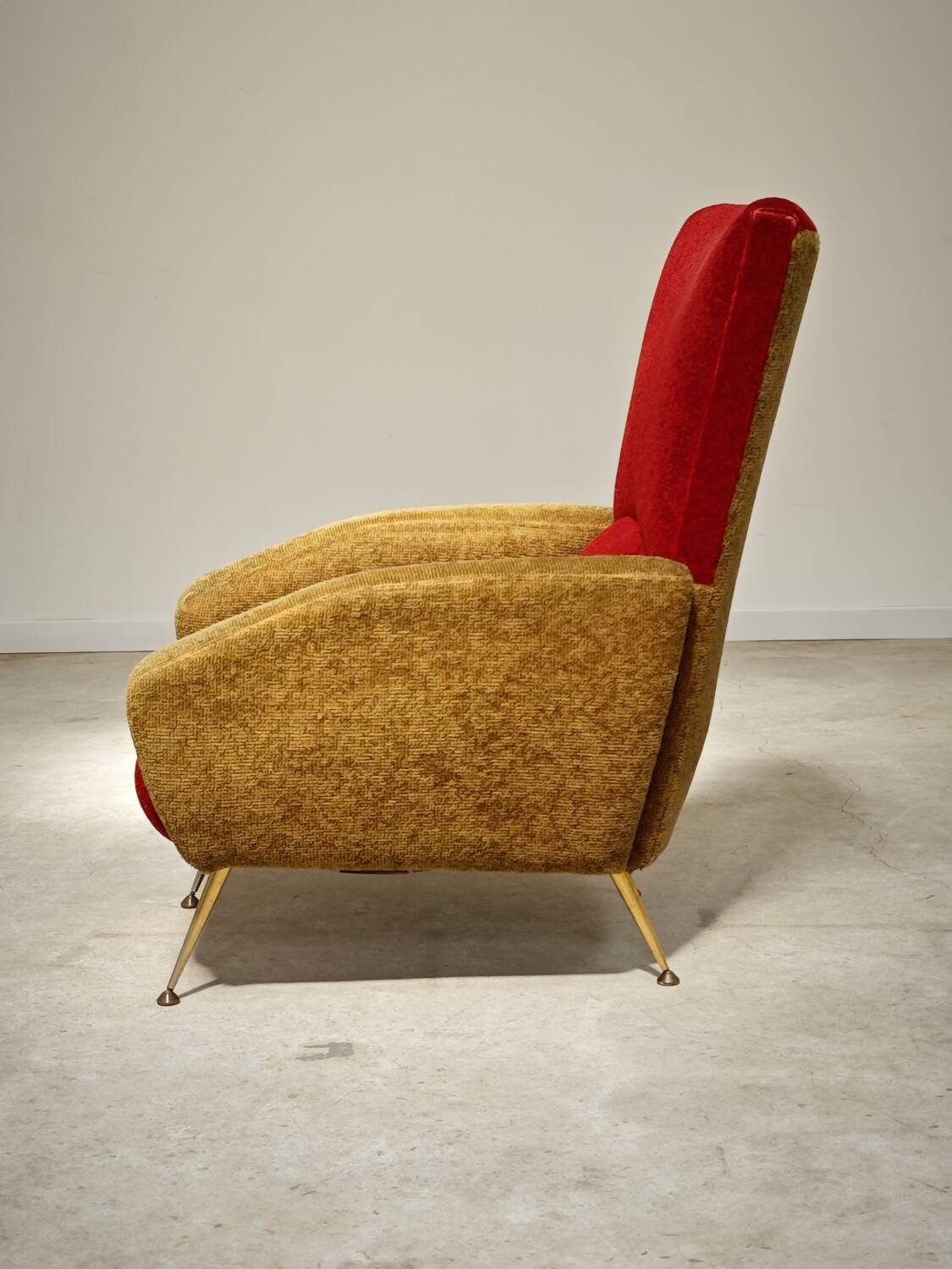 Red and mustard yellow fabric armchair in 1970s style